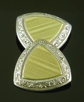 White and yellow gold cufflinks. (J9410)