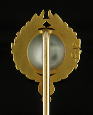 A laurel wreath and moonstone stickpin. (J9073)