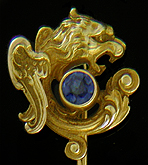 A regal griffin and sapphire stickpin. (J9135)