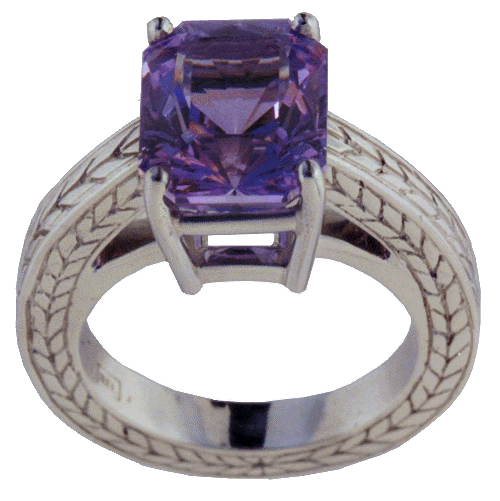 Engraved platinum ring with lavender spinel.