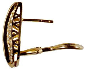 Side-view of diamond and 18kt gold earrings.